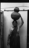 Balancing the two pot to carry water