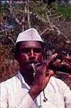 Sanadi blowing Karade Majal artist in Dharwad folk festival