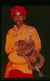 A Village folk artist with Hudukka Drum