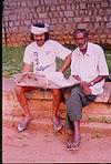 Commoners reading news paper in Udupi street