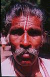 A namada dasayya seeking alms, begging in the streets