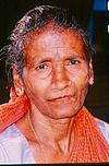 A elderly woman of laboring class