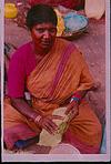 A woman selling betel leaves