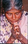 Leper Beggar praying god