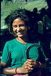 A Himalayan working lass with sickle