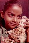 A kid with her toy, viyyali-kawal, Bangalore, 1981