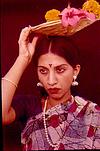 Shubha posing as a flower woman, Viyyali-kawal, Bangalore, 1981