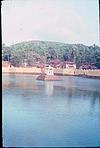 A lake beside a temple, (To be identified)