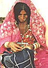 A Banjara (Gypsy) woman, lost in the intricate world of  Kasooti (needle craft)