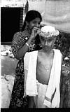 Vibha adjusting flowers on pradeeps topi. Honnawar, 1982