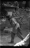Bricks carried by a laborer, 1985