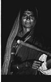 Jogati with choudike instrument, Vishwa kannada exhibition, 1985