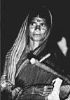 Jogati with choudike instrument, Vishwa kannada exhibition, 1985