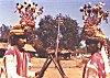 A pair of dancers with wooden sticks (Kolu Kunita)