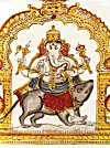 Lord Ganesh rides his favorite mouse to earth