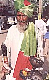 Beggar by choice: A Sufi fakir seeks alms on the street