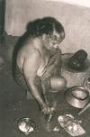 Elderly Woman at Daily Chores