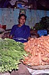 She offers a choice of carrots and okra.