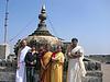 Devotees on top of Yoganarasimha Temple