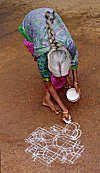 Spreading Rangoli has been everyday affair for her right from her childhood.