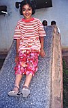 Girl Playing on a Slide