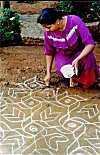 Rangoli also help to hide a distasteful road.