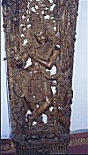 Lord Krishna in a Wooden Sculpture