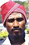 White bordered red turban.