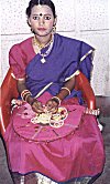 A young girl with her lots of jewelry.