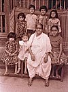 A Konkani Lady with Grandchildren