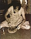 Konkani Woman in Preparation of a Special Paste