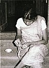 Woman Peeling Garlic