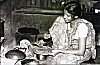 Indian Woman Preparing Breakfast on a Wooden Stove