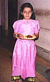Girl Carrying Offerings to Lord Krishna