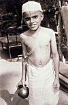 Hindu Boy with Sacred Thread Carrying Water