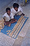 Boys Selling Oil Lamps for Deepavali