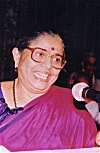 Jyotsna Speaking at a History Convention, 1995