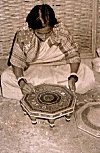 Woman Paints Wooden Table, Sondur 