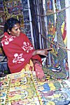 Bengali Artist Explainting Folk Paintings