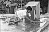 Handicapped Boy Cleaning Washing Stone