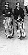 Friends in Long Skirts Walking Home