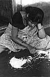 Indian Woman Cleaning Rice