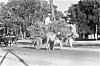 Man Riding on Top of Cargo