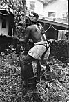 Man Climbing a Coconut Tree