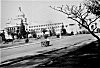 Man Pushes Cart in front of Secretariat