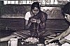 Woman making floral jewelry