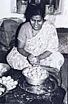 Woman Rolling Laddu