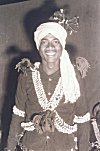 A Dancer with Cowrie Decorations