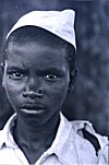 African Indian Boy in Torn Shirt