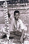 Boy Selling Garlands